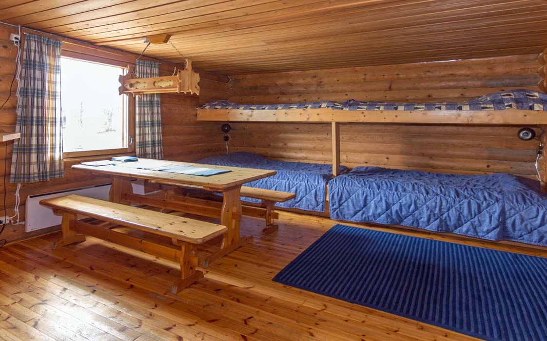 Couchages d’un chalet avec sauna à l’hôtel Galdotieva